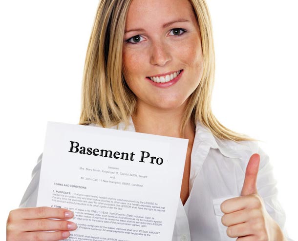 photo of a woman holding a bid from basement pro